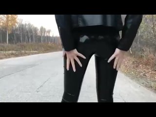 girl in leather, walking in leggings