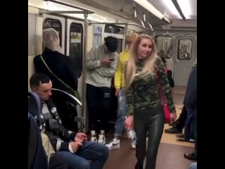 blonde in leather leggings on the subway