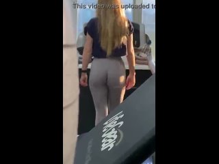 sports girl in leggings on a treadmill
